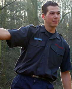 Englishlads.com: Fireman Chris unloads in the woods, helmet to helmet...